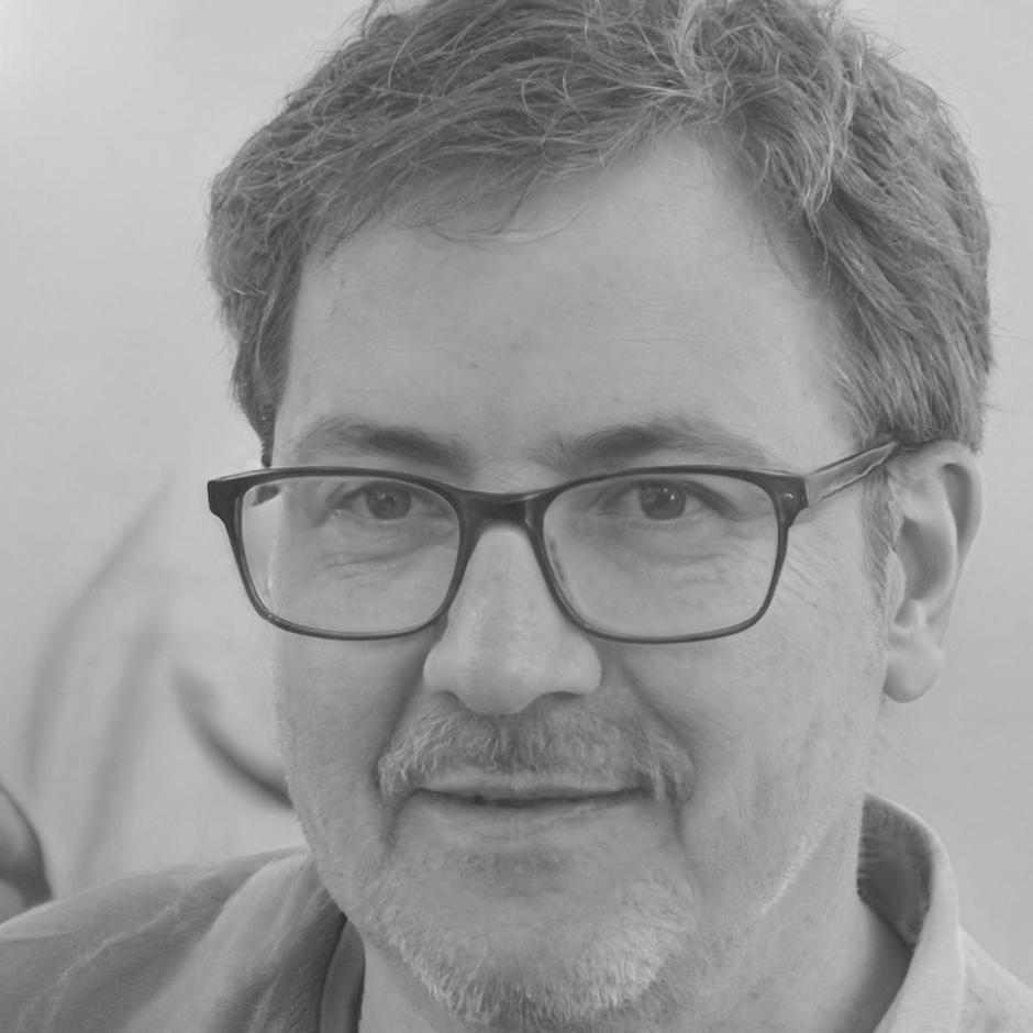 Financial advisor Marcus reviewing budget plans