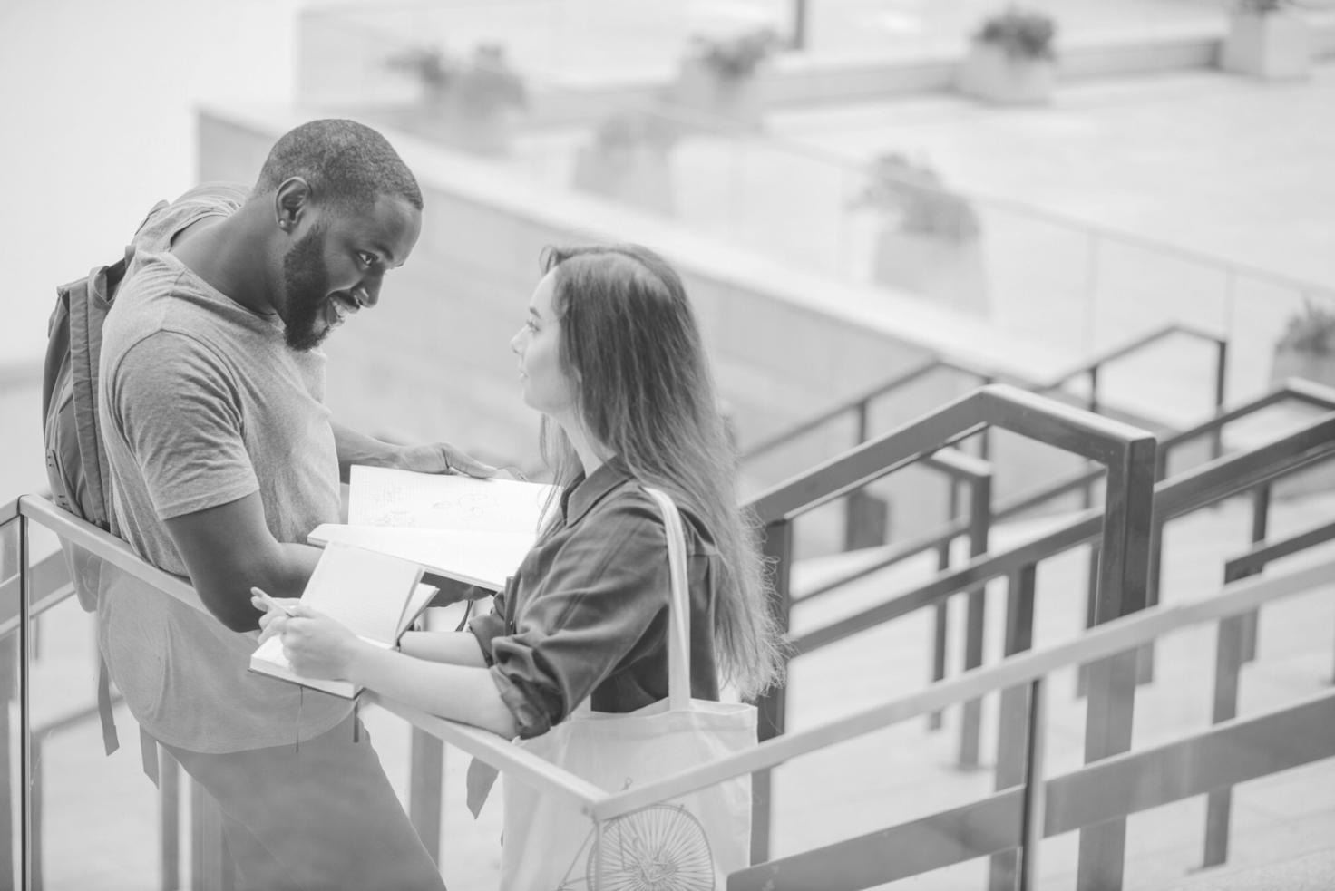 Students reviewing financial planning materials together